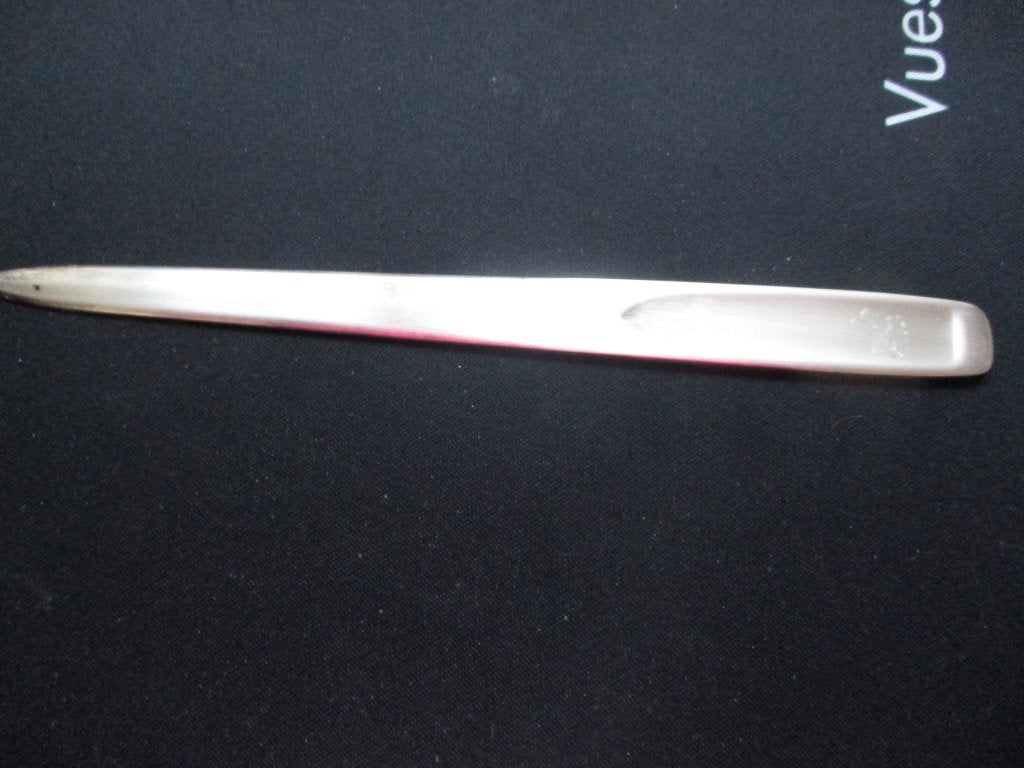 Brievenopener., Ophalen