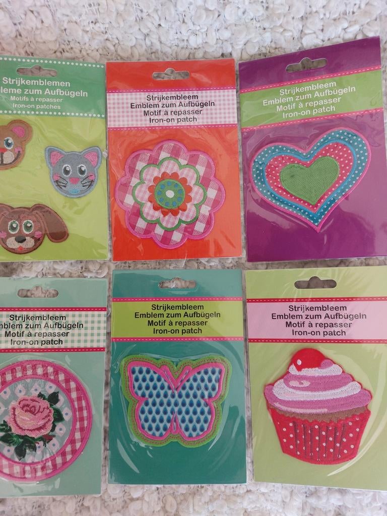 9 nieuwe pakjes met strijkemblemen, Hobby en Vrije tijd, Naaien en Fournituren, Ophalen of Verzenden, Nieuw, Applicatie
