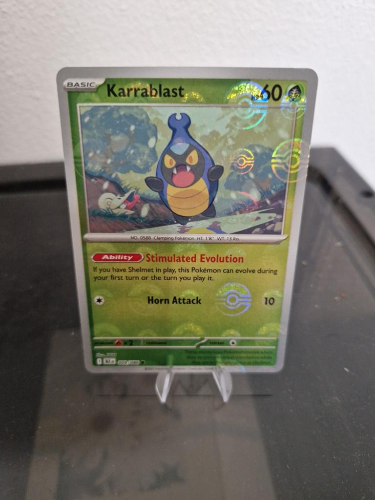 Karrablast 009/086 Pokeball, Ophalen of Verzenden, Zo goed als nieuw, Losse kaart, Foil