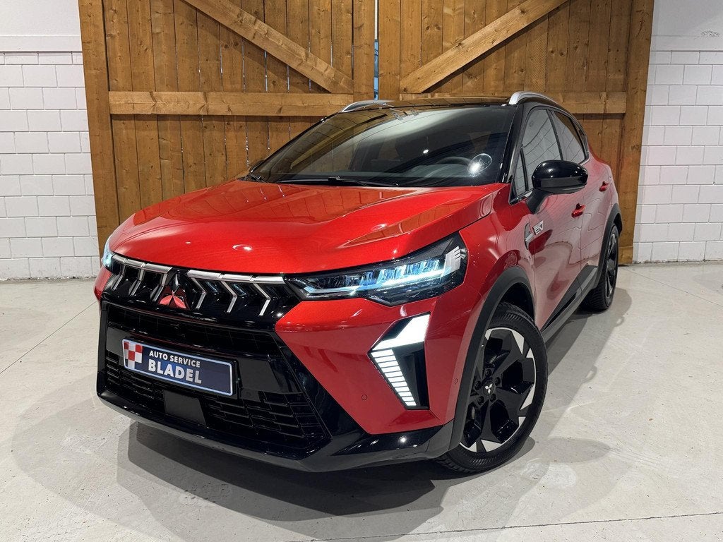 Mitsubishi ASX 1.6 HEV AT full options, Gebruikt, Leder en Stof, Origineel Nederlands, Bedrijf