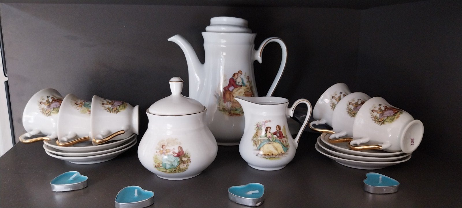 Mini thee servies hofmakend paar barok, Ophalen