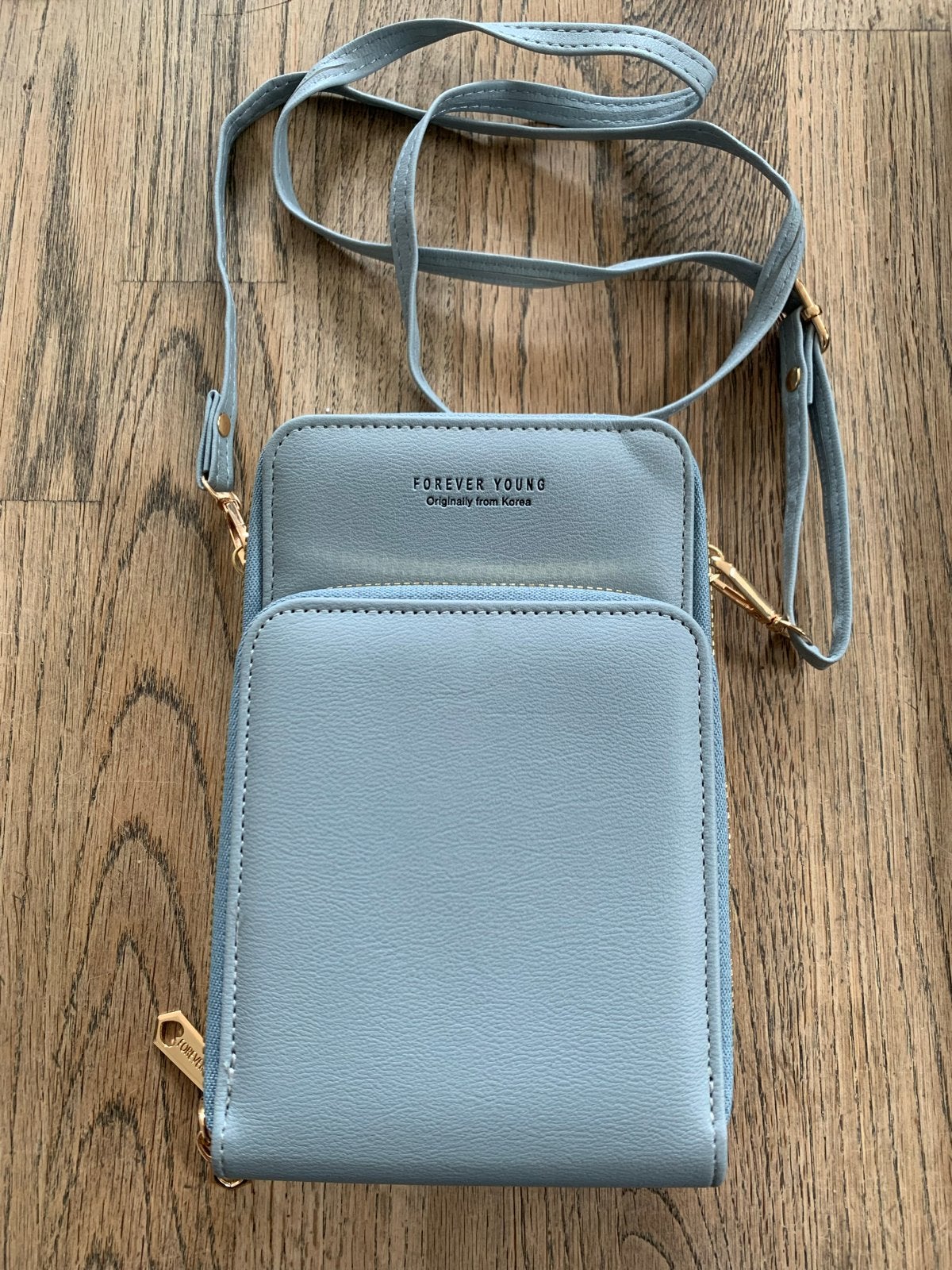 Lichtblauw telefoon tasje, Ophalen of Verzenden, Nieuw, Blauw, Overige typen
