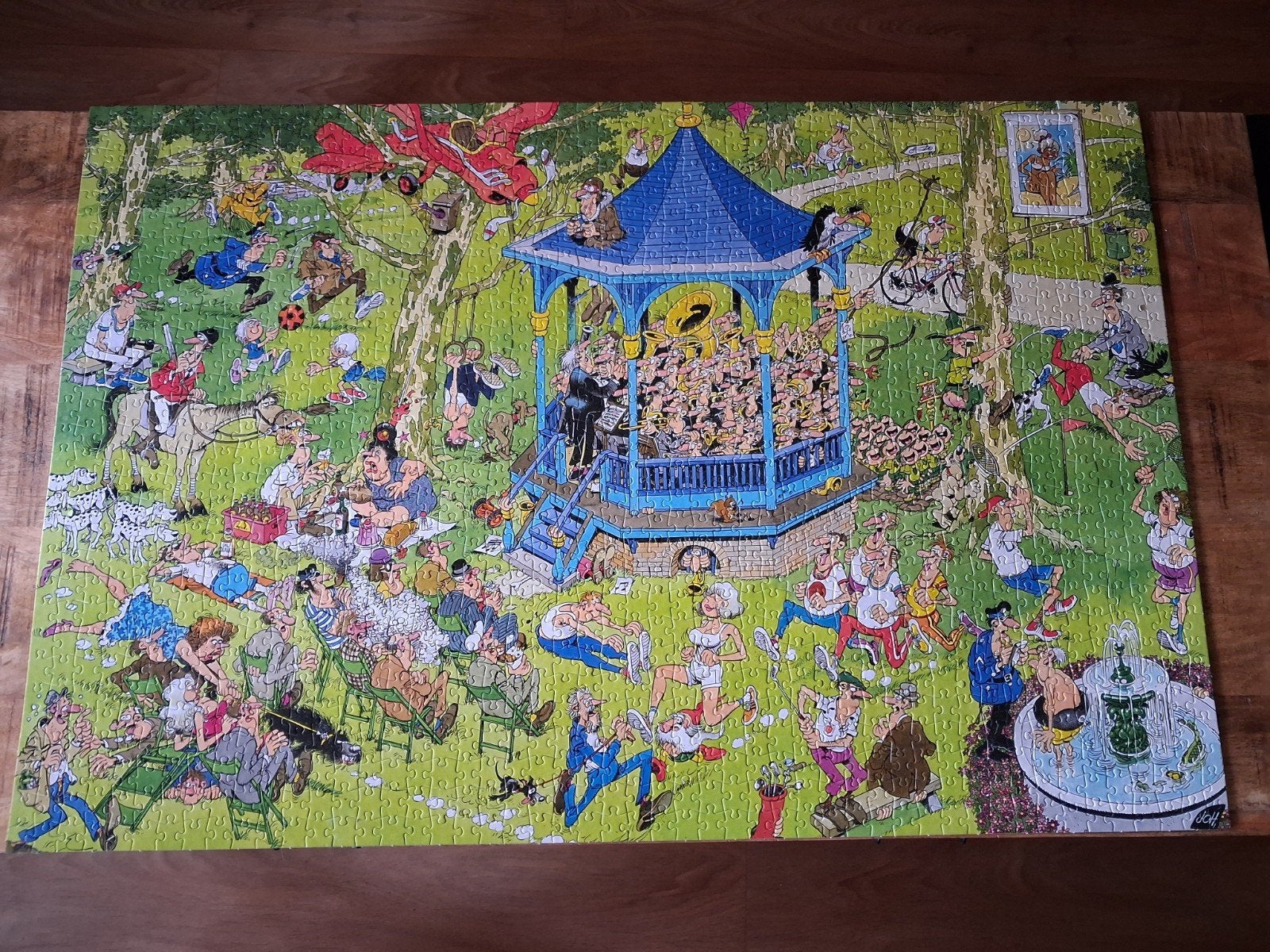 Jan van Haasteren puzzel - Het Muziekpavilloen - 1500 stukje, Ophalen of Verzenden, 500 t/m 1500 stukjes, Zo goed als nieuw, Legpuzzel