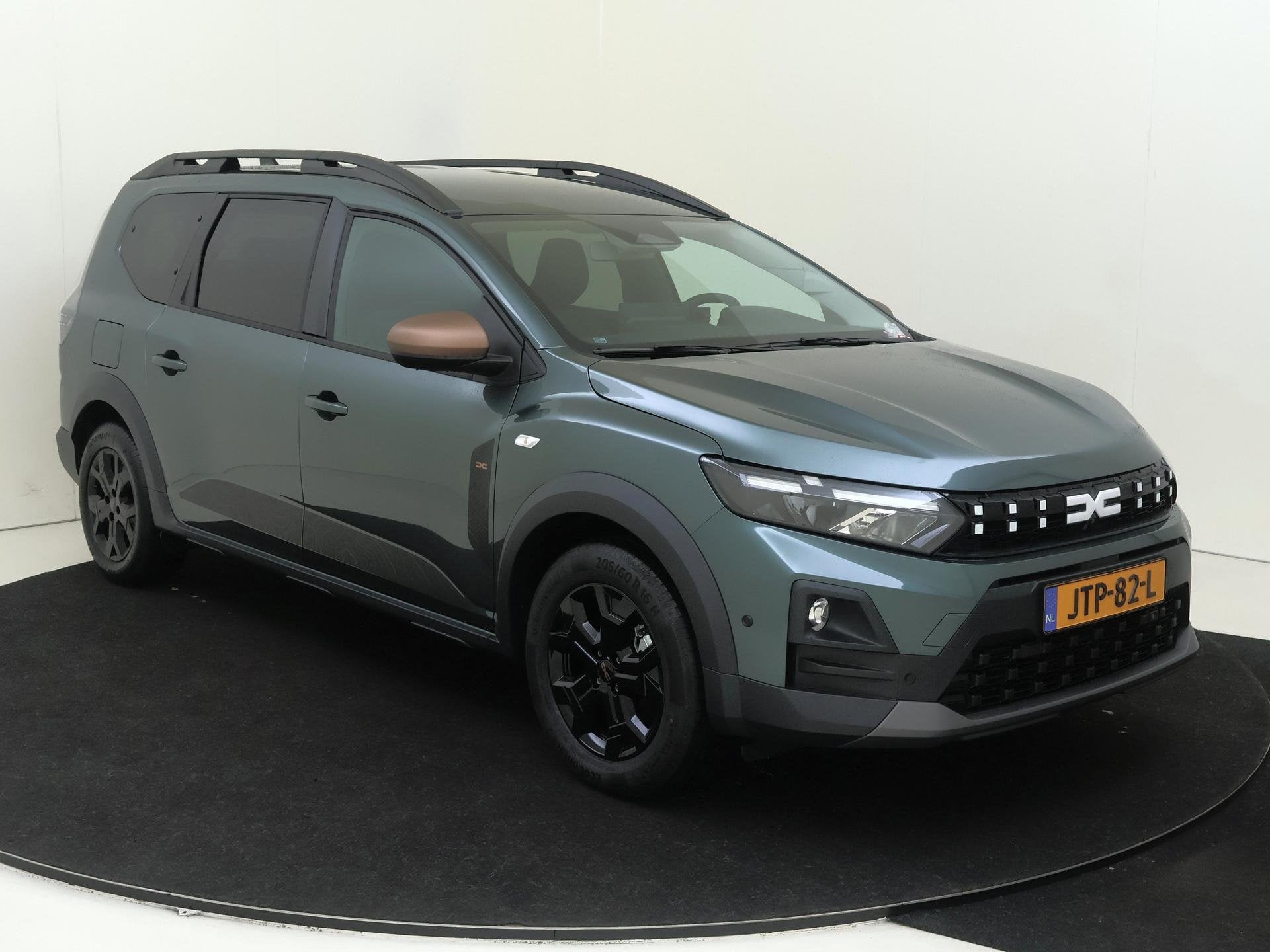 Dacia Jogger 1.8 hybrid 155 Limited Edition 7persoons | Navi, Auto's, Dealer onderhouden, Euro 6, 7 stoelen, Origineel Nederlands