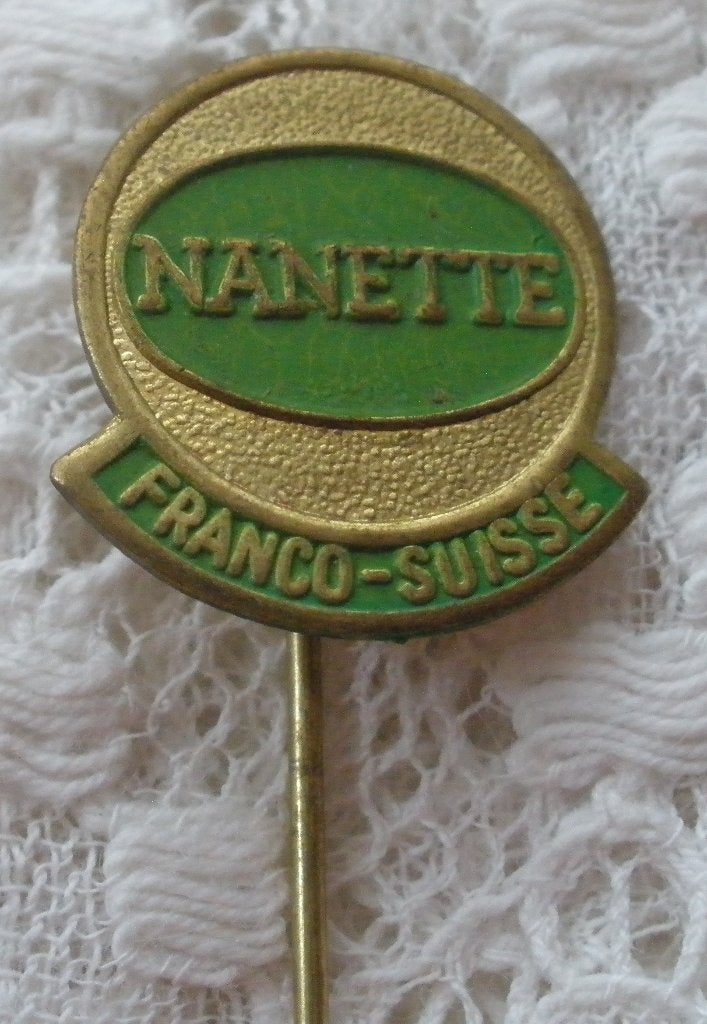 Oud speldje Nanette - Franco - Suisse, Ophalen of Verzenden, Zo goed als nieuw, Overige onderwerpen, Speldje of Pin