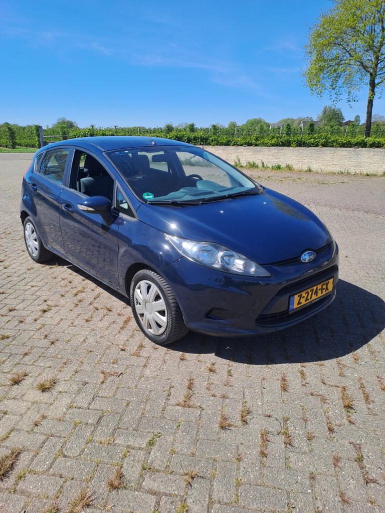 Ford Fiësta 1.25 60KW 5DR 2009 Blauw, Voorwielaandrijving, 1242 cc, Blauw, Handgeschakeld