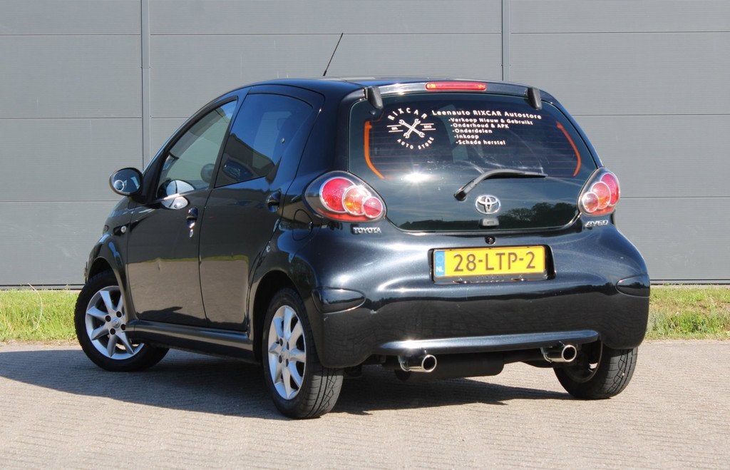 Toyota Aygo 1.0-12V Comfort Airco Carplay SportUitlaat, Voorwielaandrijving, Stof, Zwart, 4 stoelen
