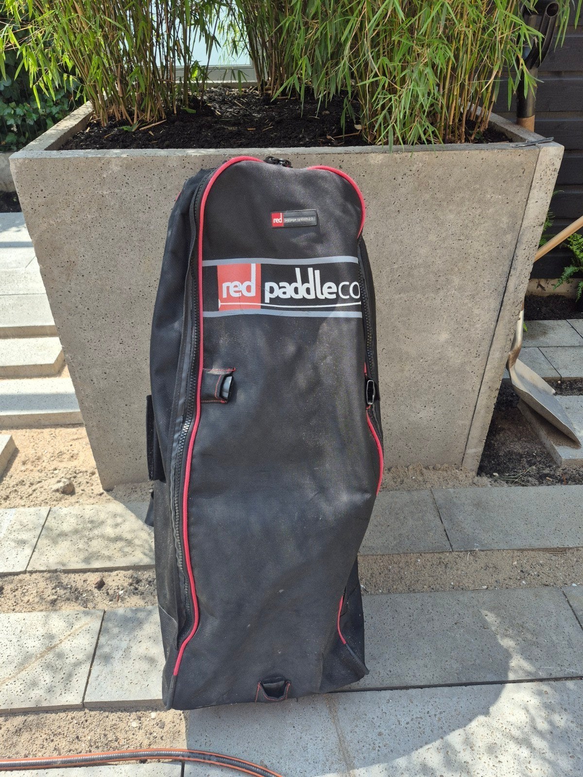 Red Paddle sup tas, Ophalen