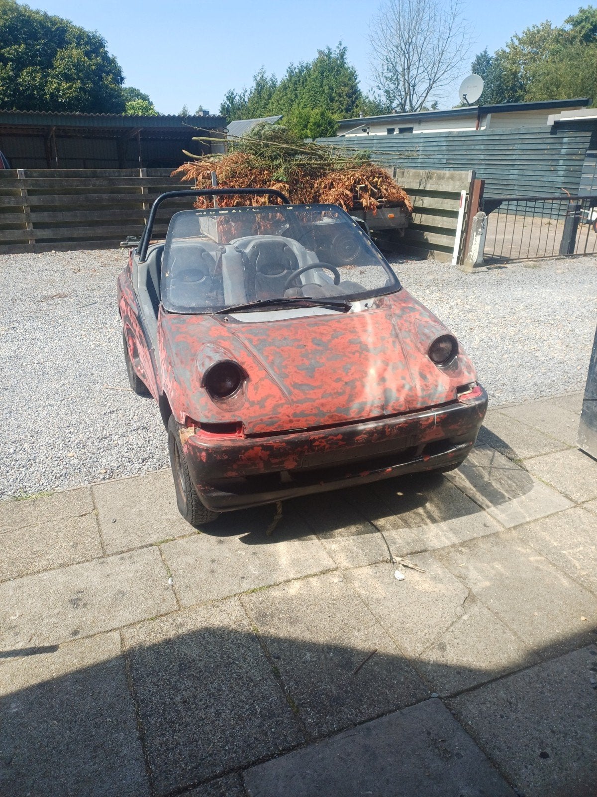 cabriolet brommobiel Microcar, Ophalen
