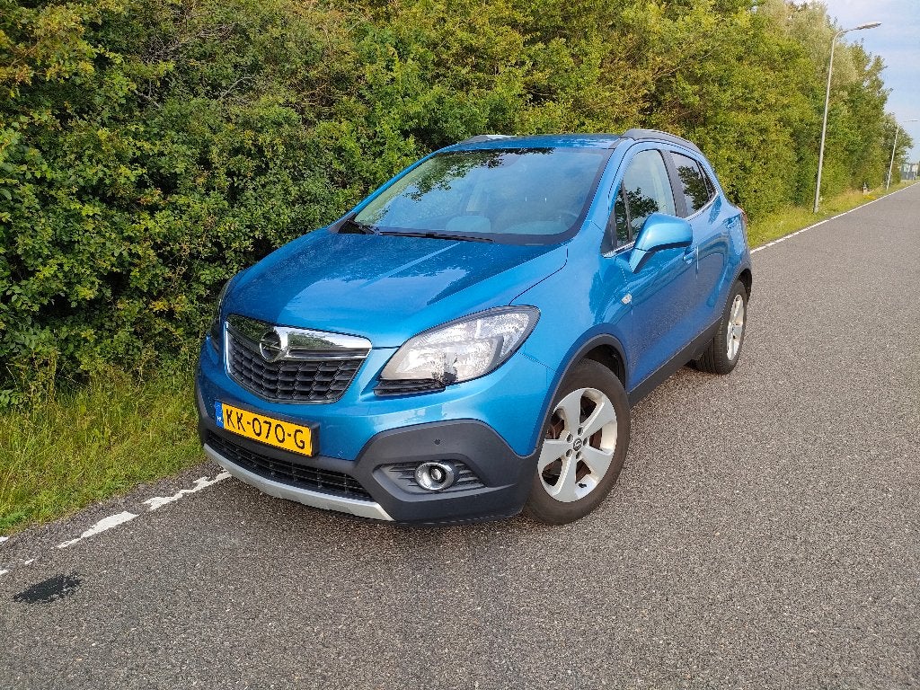 Opel Mokka Innovation 1.4 Turbo 140pk Automaat 2016 Blauw, Auto's, Zwart, Blauw, Leder en Stof, Origineel Nederlands
