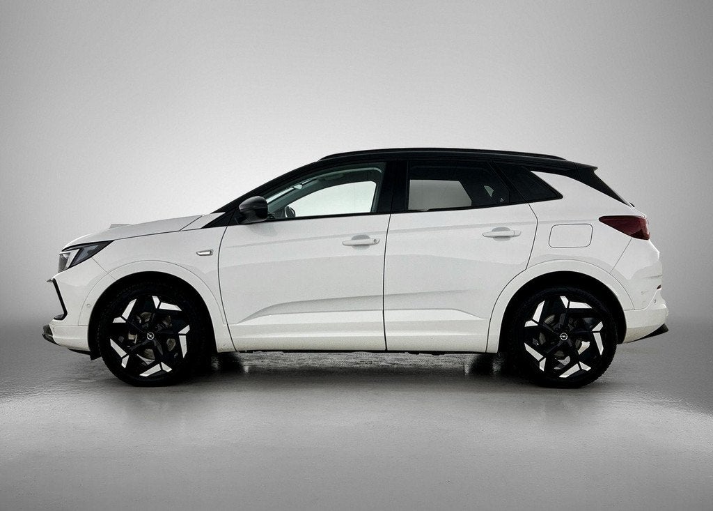 Opel Grandland 1.6 Turbo Plug-In Hybrid 4x4 GSe | Stoel verw, Auto's, Opel, 12 maanden, Euro 6, 4 cilinders, Wit
