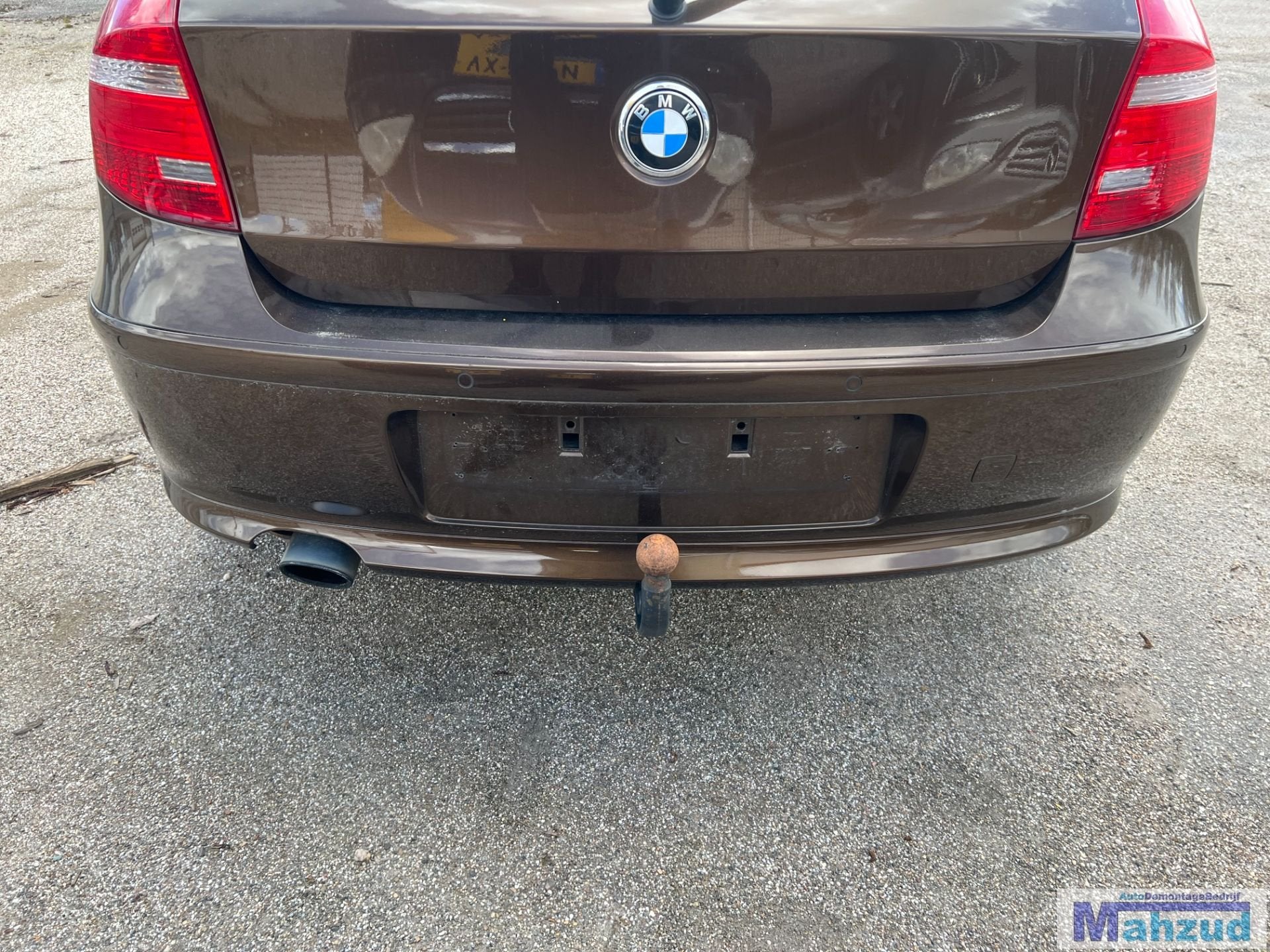 BMW 1 serie E87 Bruin B09/8 achterbumper 2004-2011, Auto-onderdelen, Petuelring 130
80788  Munich, DE, Gebruikt, Info@bmw.de, Ophalen of Verzenden