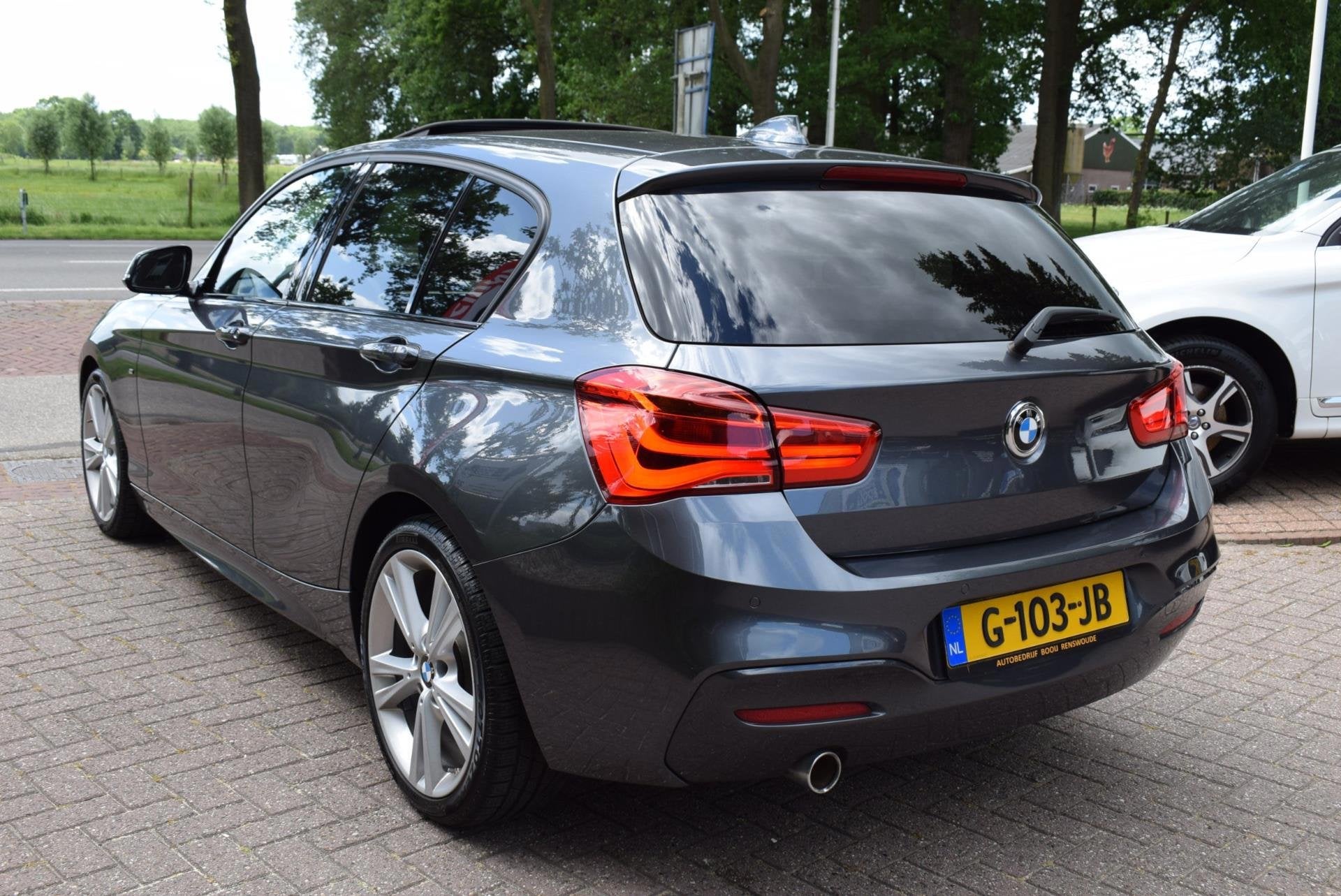 BMW 1-serie 118I M pakket! Edition/5DRS/AUTOM/DAK/CRUISE/NAV, Auto's, Dealer onderhouden, Gebruikt, Origineel Nederlands, Bedrijf