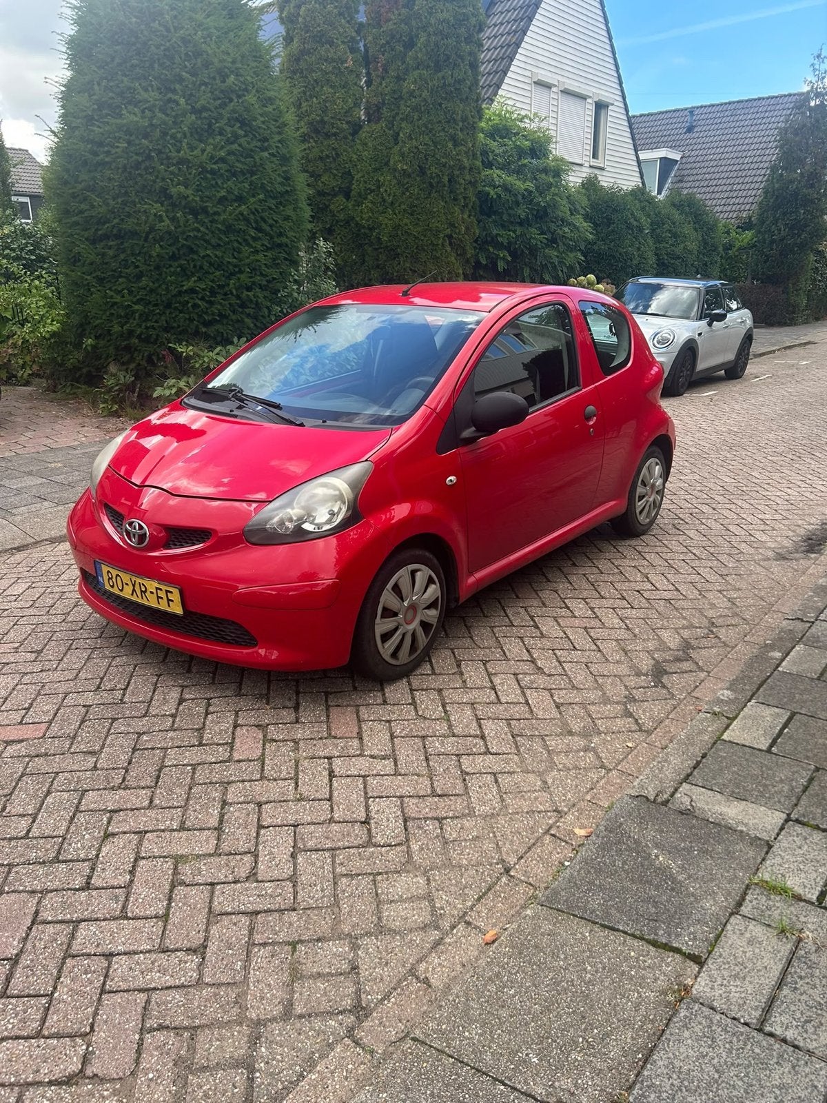 Toyota Aygo 1.0 12V Vvt-i 3DRS MMT 2007 Rood, Auto's, Voorwielaandrijving, 4 stoelen, 68 pk, Origineel Nederlands