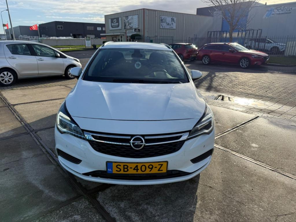Opel Astra 1.0 Turbo 77KW Sports Tourer 2018 Wit, Auto's, Voorwielaandrijving, Stof, Zwart, 1178 kg