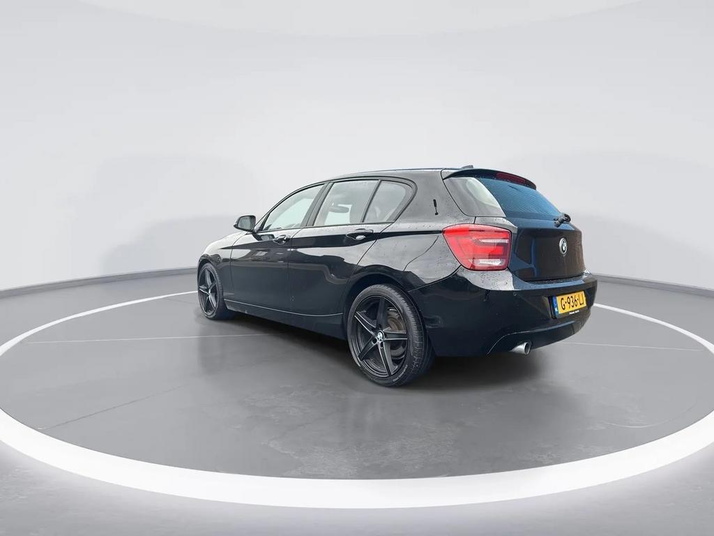 BMW 1-Serie 116I 100KW 5DR 2011 Zwart, Auto's, BMW, 1-Serie, 4 cilinders, Zwart, 1200 kg