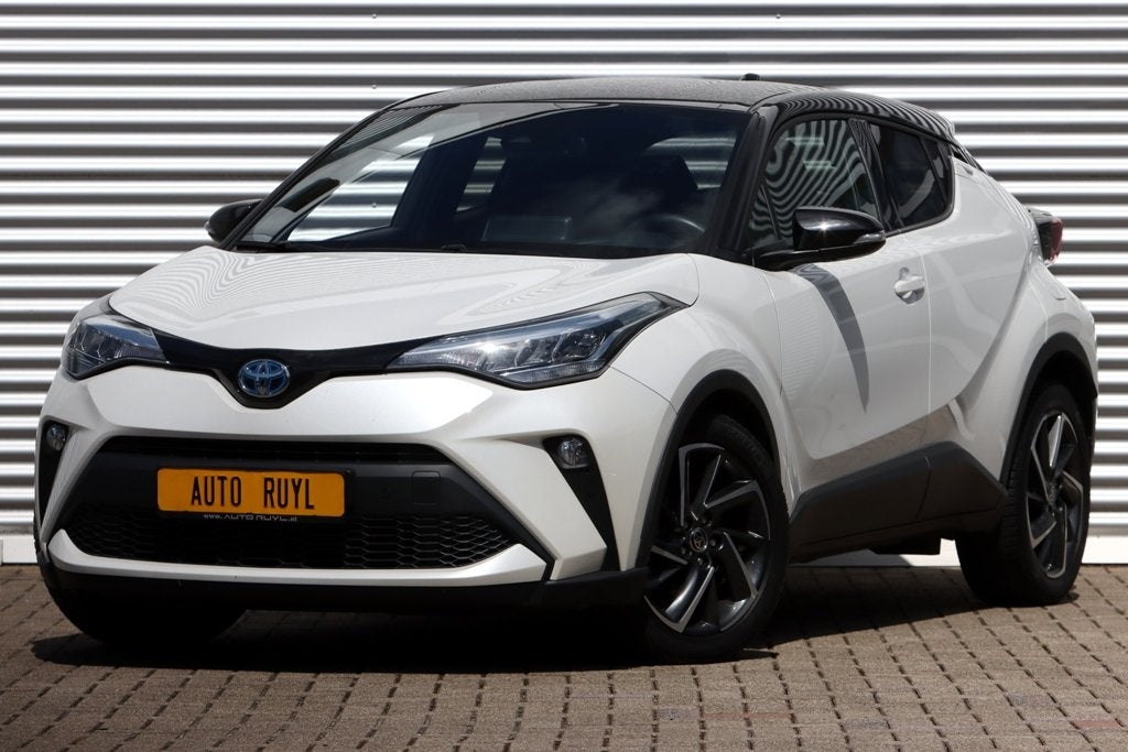 Toyota C-HR 1.8 Hybrid Bi-Tone Winter + Safety-Pakket, Auto's, Stof, Gebruikt, Zwart, 4 cilinders