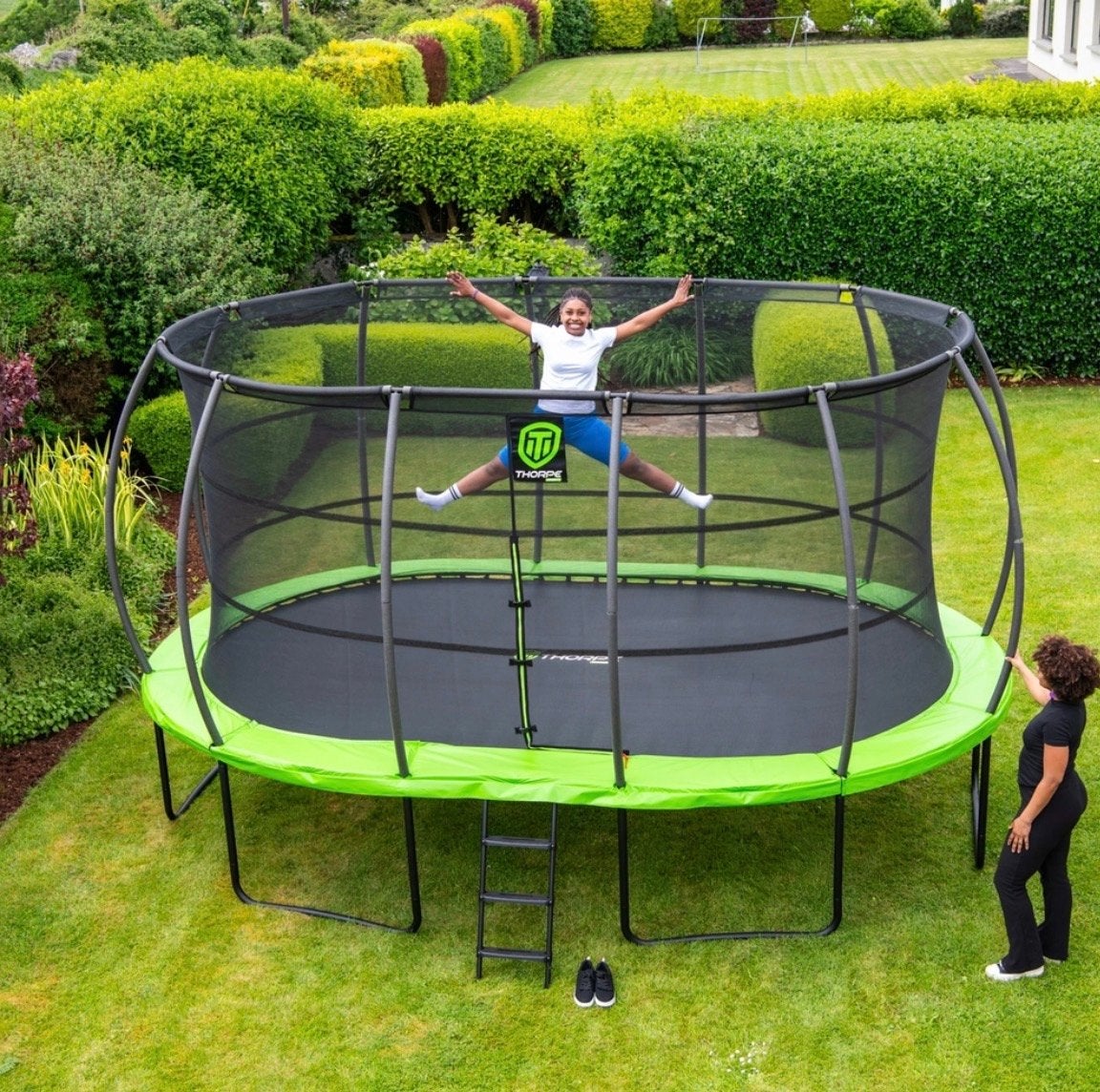 Thorpe Sports Ovale Trampoline 15x10ft met Veiligheidsnet, Kinderen en Baby's, Ophalen, Gebruikt