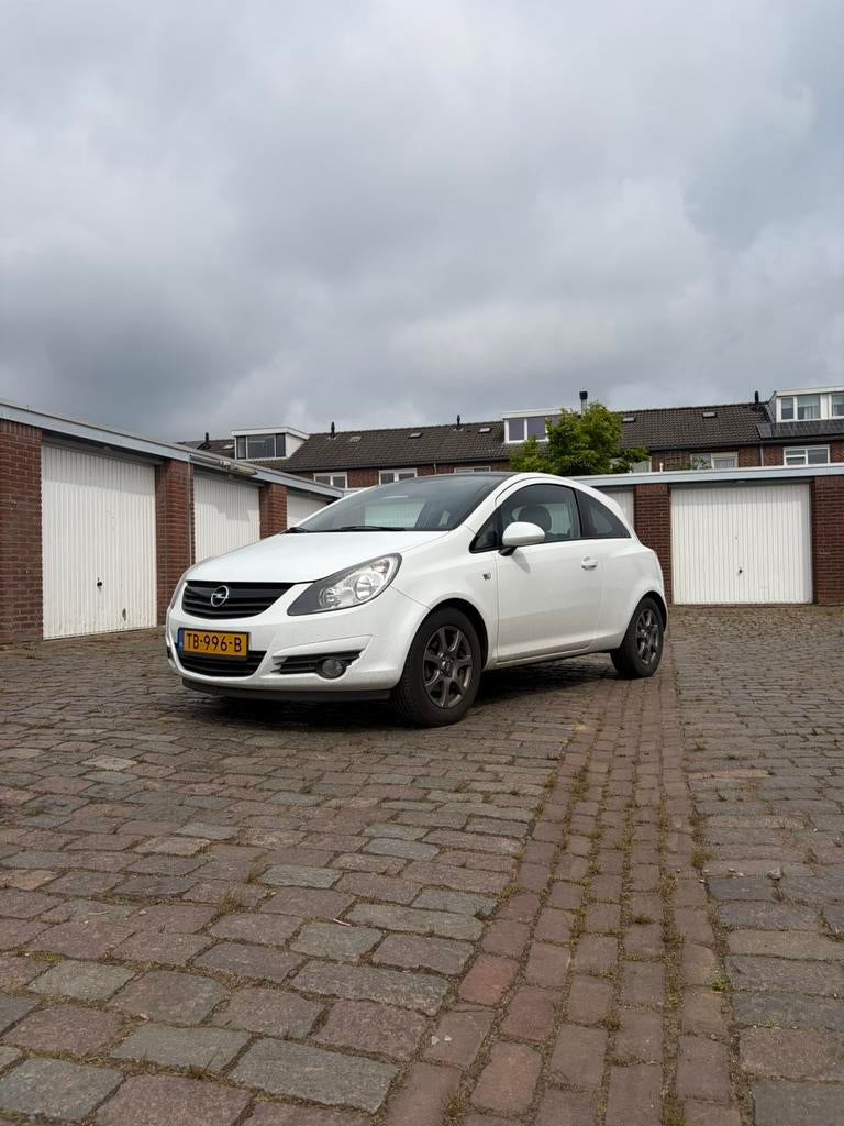 Opel Corsa 1.2 16V 3D WR 2010 Wit, Auto's, Voorwielaandrijving, 450 kg, 40 €/maand, 4 cilinders