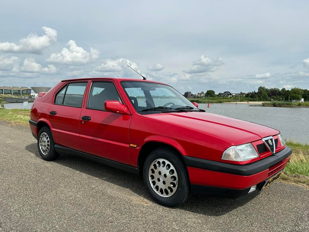 Alfa Romeo 33 Imola, Auto's, Alfa Romeo, Particulier, Lichtmetalen velgen, Benzine, Handgeschakeld, Rood, Zwart, Leder en Alcantara