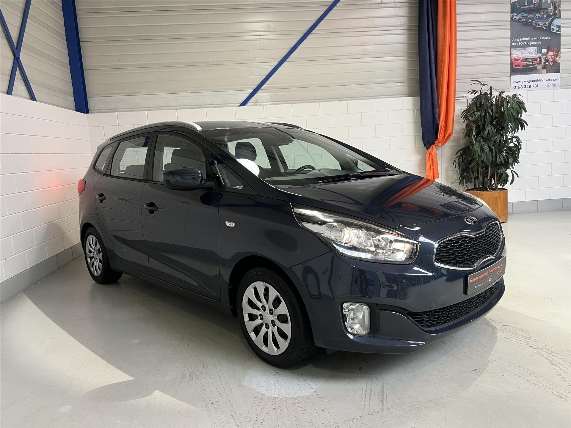 Kia Carens 1.6 GDi 135pk 7-Persoons Navi, Climate, Cruise, T, Auto's, Keurmerk '100% Onderhouden', Gebruikt, 4 cilinders, Blauw