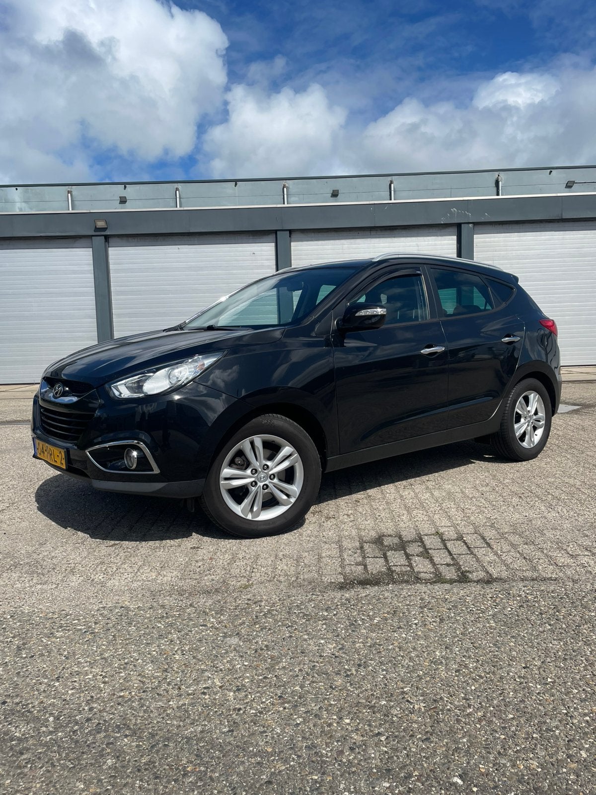 Hyundai iX35 2.0 2011 AUTOMAAT / CRUISE / CLIMA / TREKHAAK!!, Zwart, 4 cilinders, Leder en Stof, Origineel Nederlands
