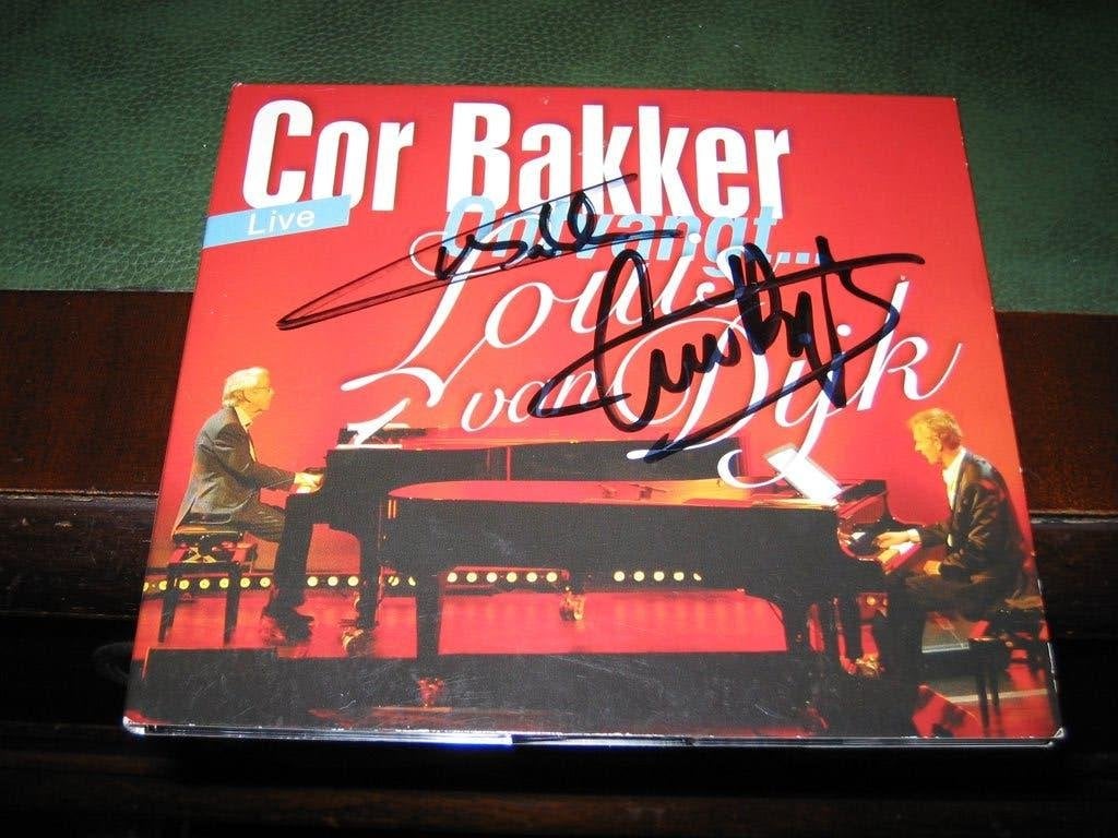 Cor Bakker ontvangt Louis van Dijk – Gesigneerd - , Ophalen of Verzenden, Jazz, Gesigneerd
