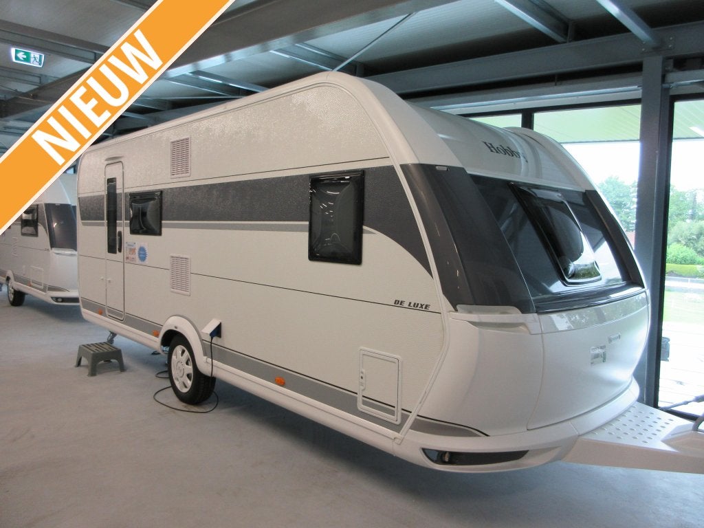 Hobby De Luxe 560 KMFE +gratis Mover, Caravans en Kamperen, Caravans, Schokbreker, Standaardzit, 5 tot 6 meter, Tot en met 6