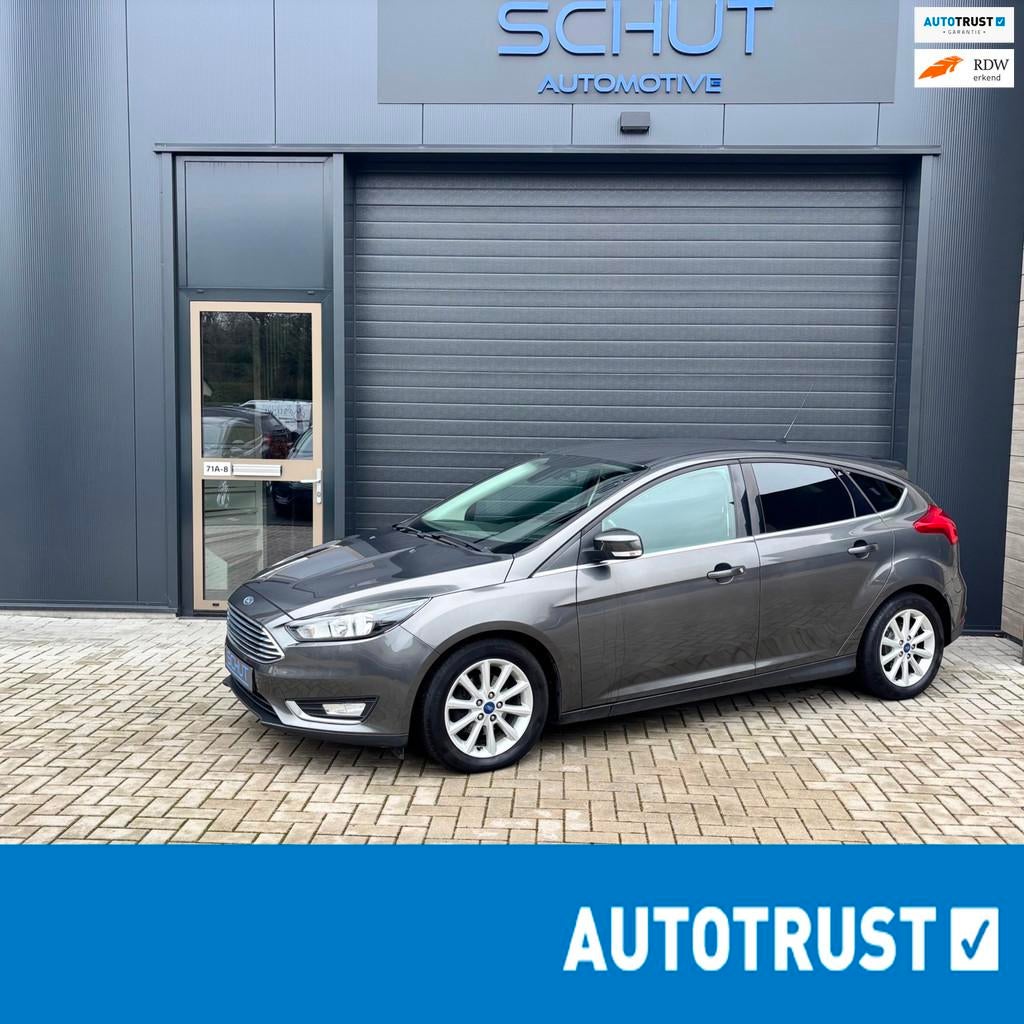 Ford Focus 125pk Titanium CLIMA | NAVI |CRUISE CONTROL | STO, Auto's, Ford, Zwart, Bedrijf, Handgeschakeld, Zilver of Grijs