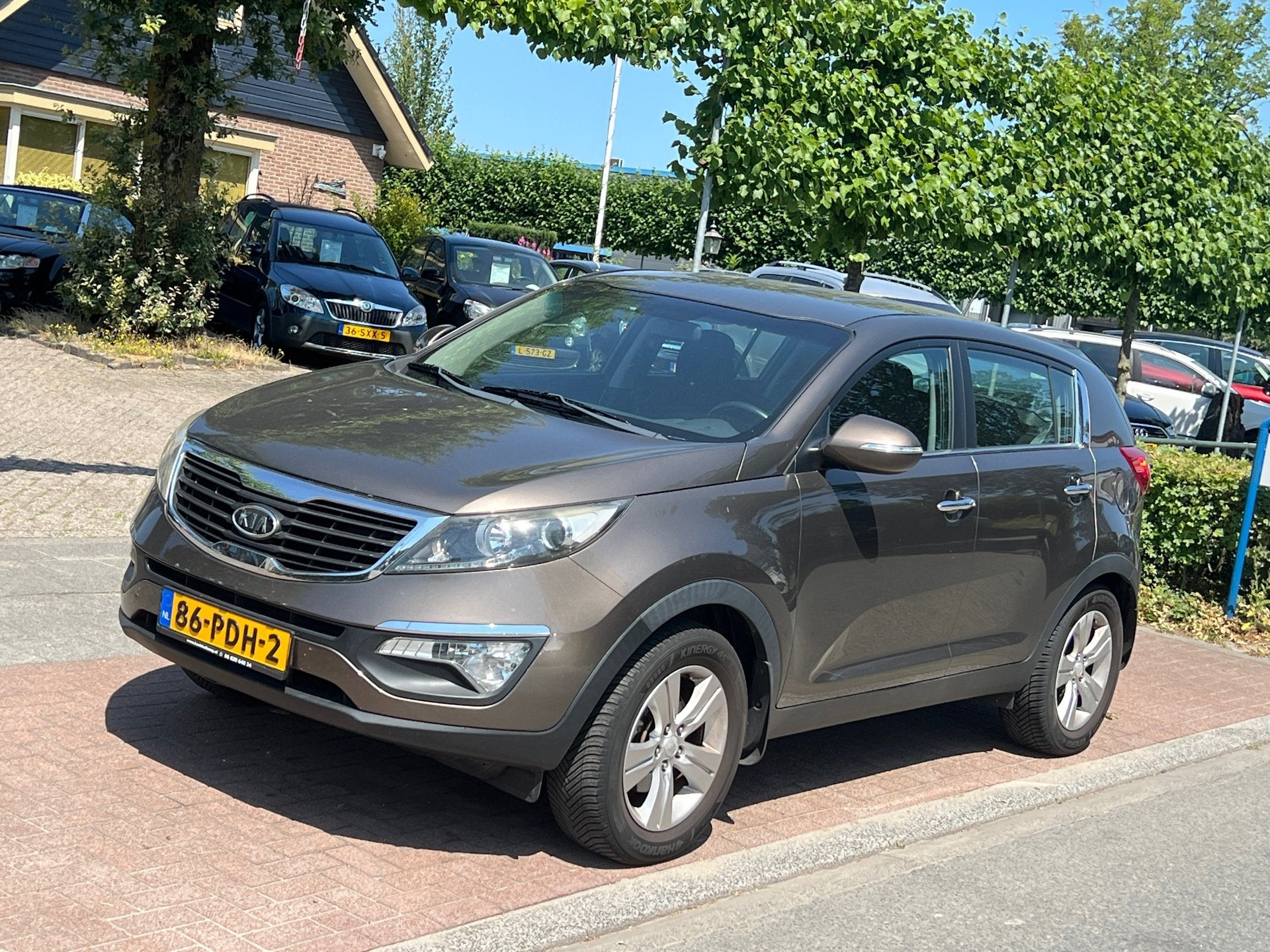Kia Sportage 2.0 X-ecutive *TG 1900kg I APK 7-2027, Gebruikt, 4 cilinders, Bruin, 163 pk