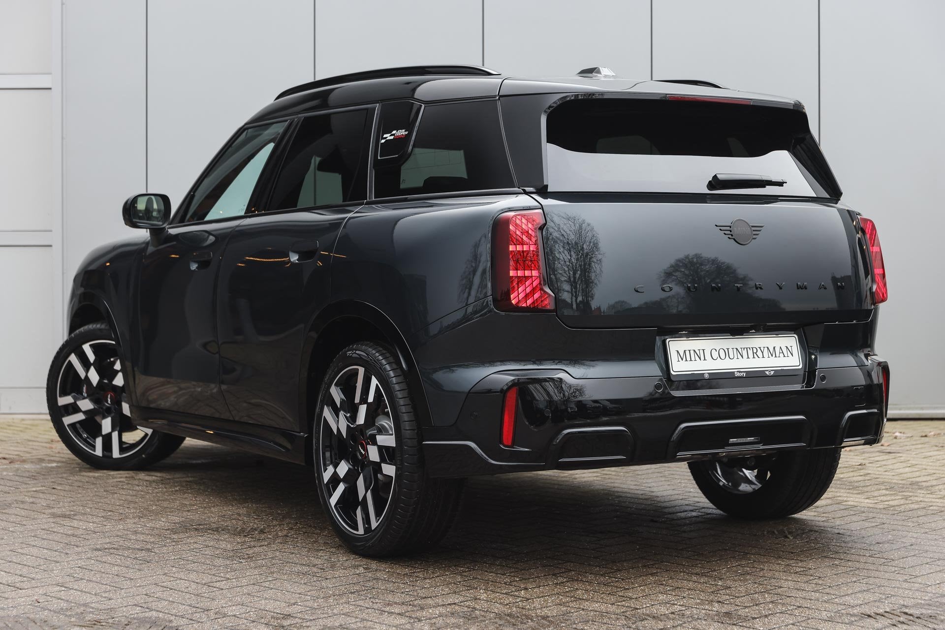 MINI Countryman C JCW Automaat / Panoramadak / Trekhaak / JC, Auto's, Mini, Dealer onderhouden, Met garantie (alle), Leder, Bedrijf