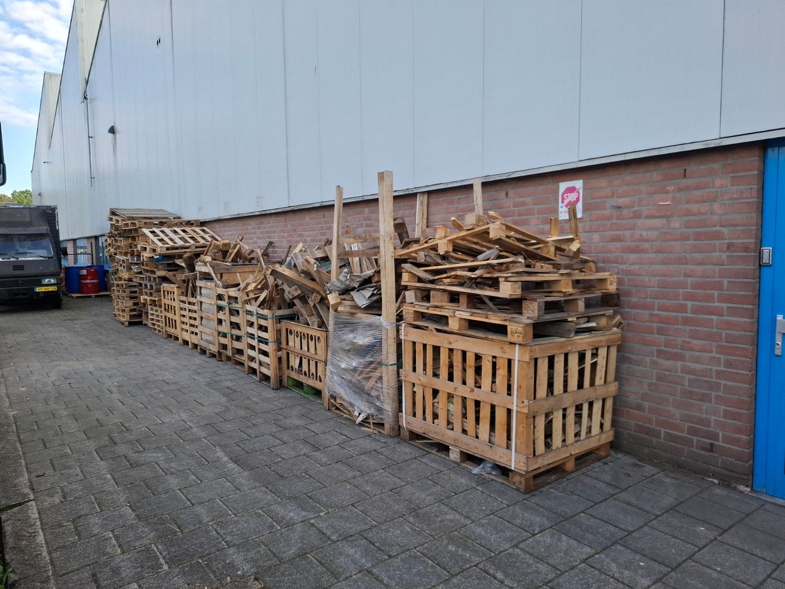 Grote partij gebruikte pallets en houtafval, 6 m³ of meer, Ophalen