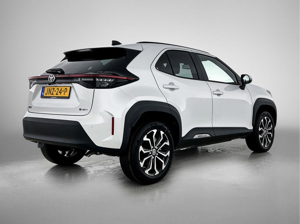 Toyota Yaris Cross 1.5 Hybrid 115 Dynamic | Comfort Pack |, Auto's, Toyota, 12 maanden, Stof, 116 pk, Wit