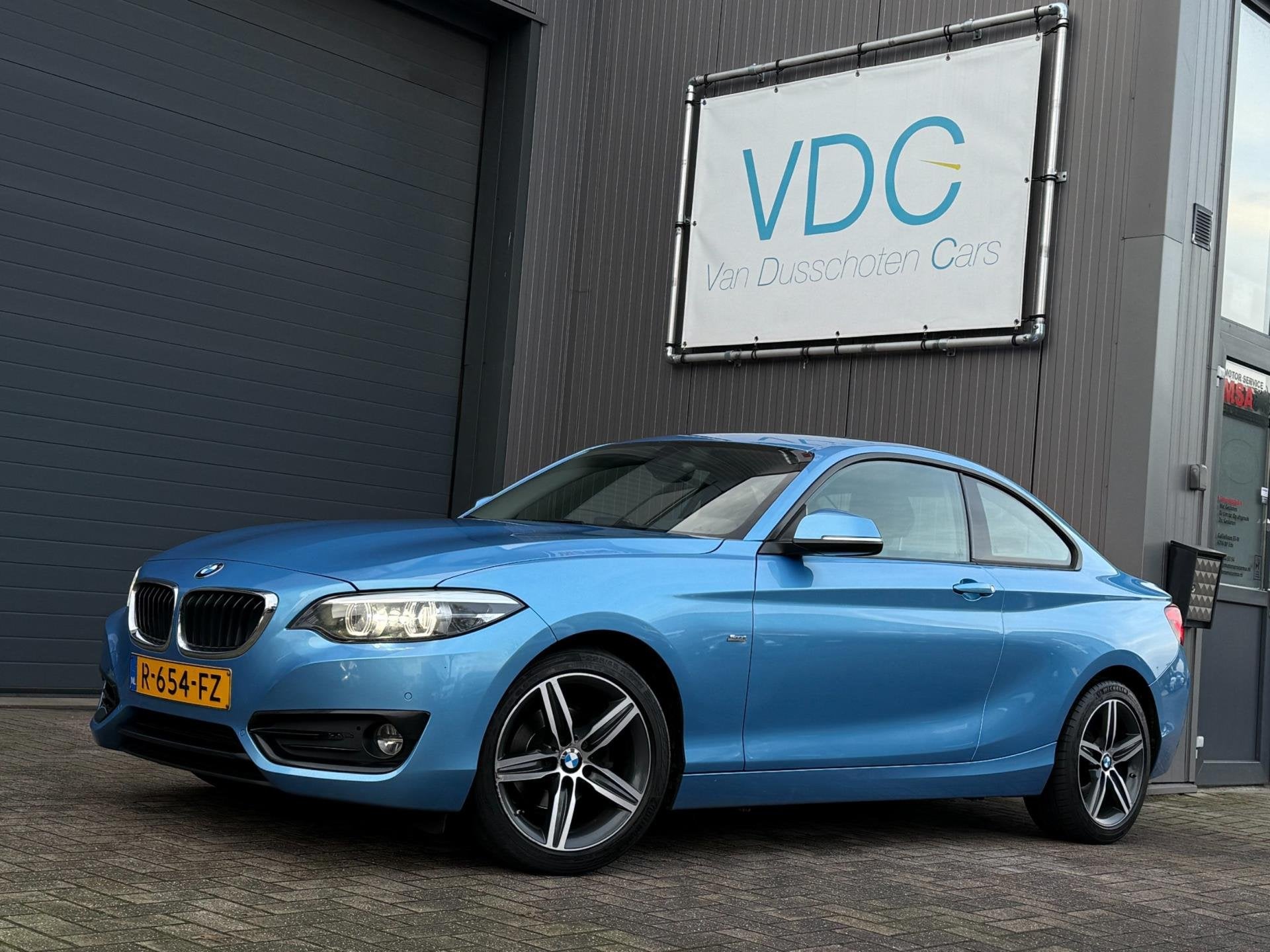 BMW 2-serie Coupé 218d High Executive | Automaat | Xenon, Auto's, Automaat, 4 cilinders, Diesel, 154 €/maand