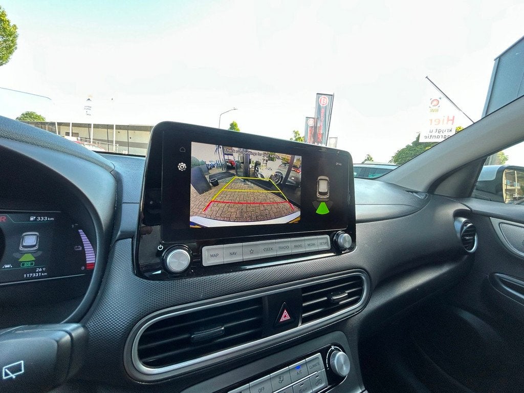 Hyundai Kona EV Fashion 64 kWh Cam|PANO|SOH 100%|Warmtepomp, Auto's, Hyundai, 12 maanden, Stof, Gebruikt, Wit