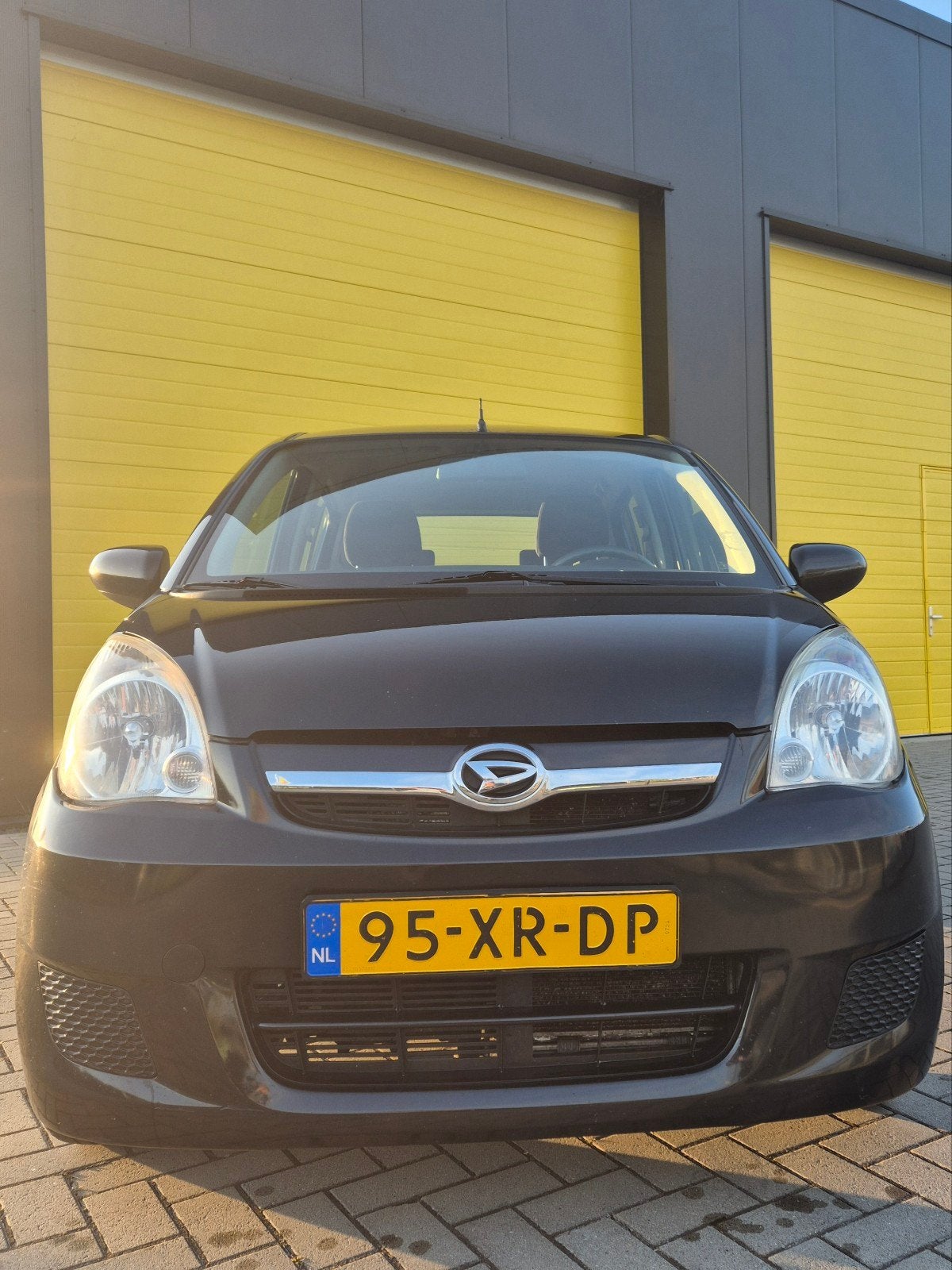Daihatsu Cuore 1.0 Premium 5D 2007 APK tot juli 2027, Auto's, Voorwielaandrijving, Stof, Zwart, 18 €/maand