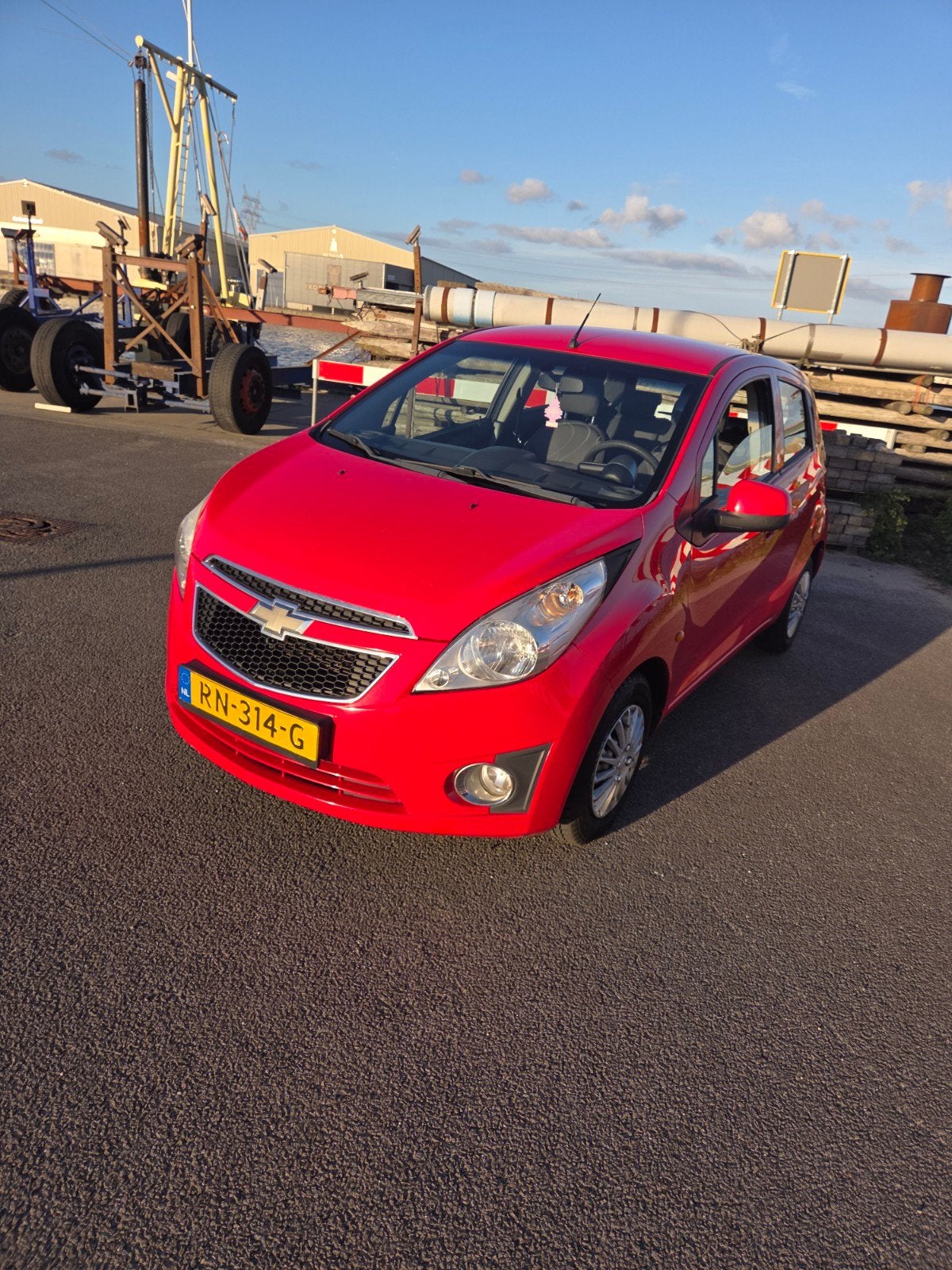 Chevrolet Spark 1.0 benzine   2011 Rood, Auto's, Voorwielaandrijving, 839 kg, Stof, Airbags