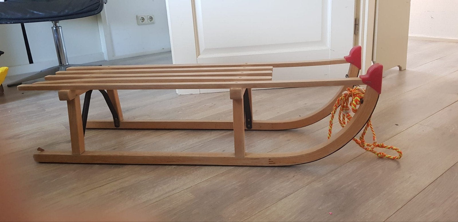 Houten slee, Ophalen