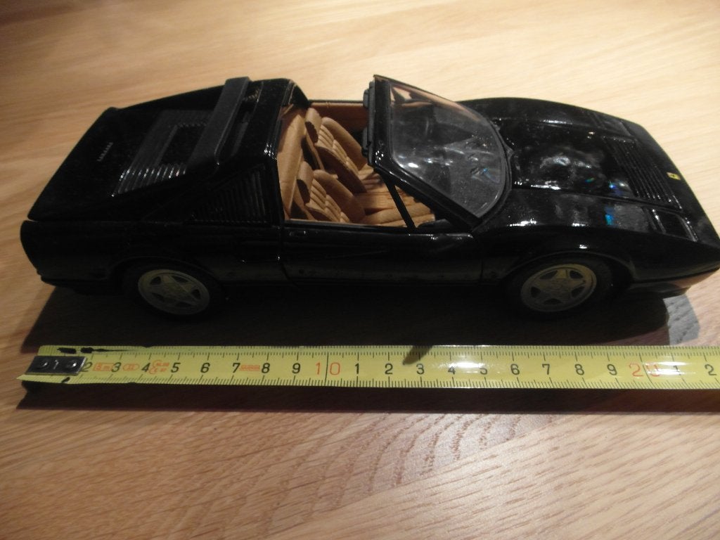 Te koop een zwarte cabrio Ferrari modelauto schaal 1:18., Ophalen, Auto, Anson
