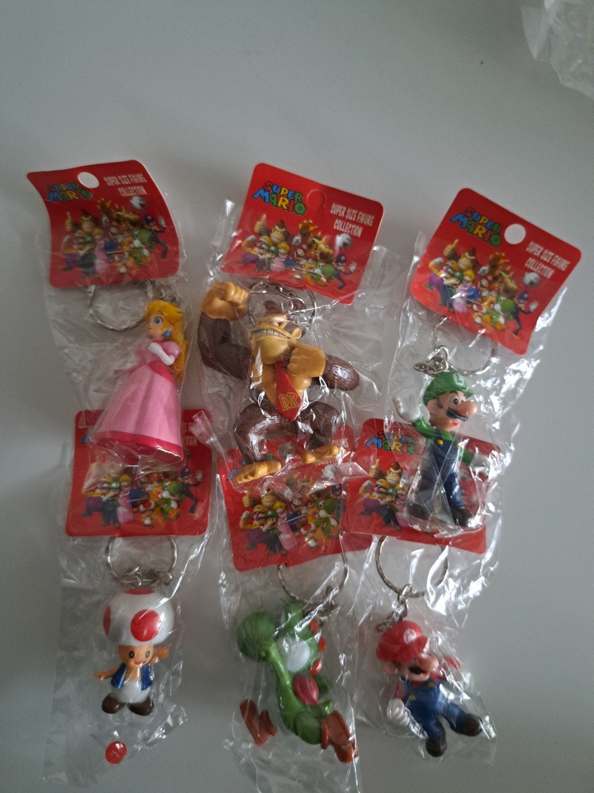 Nieuw mario sleutelhanger set, Verzamelen, Poppetjes en Figuurtjes, Ophalen of Verzenden, Nieuw