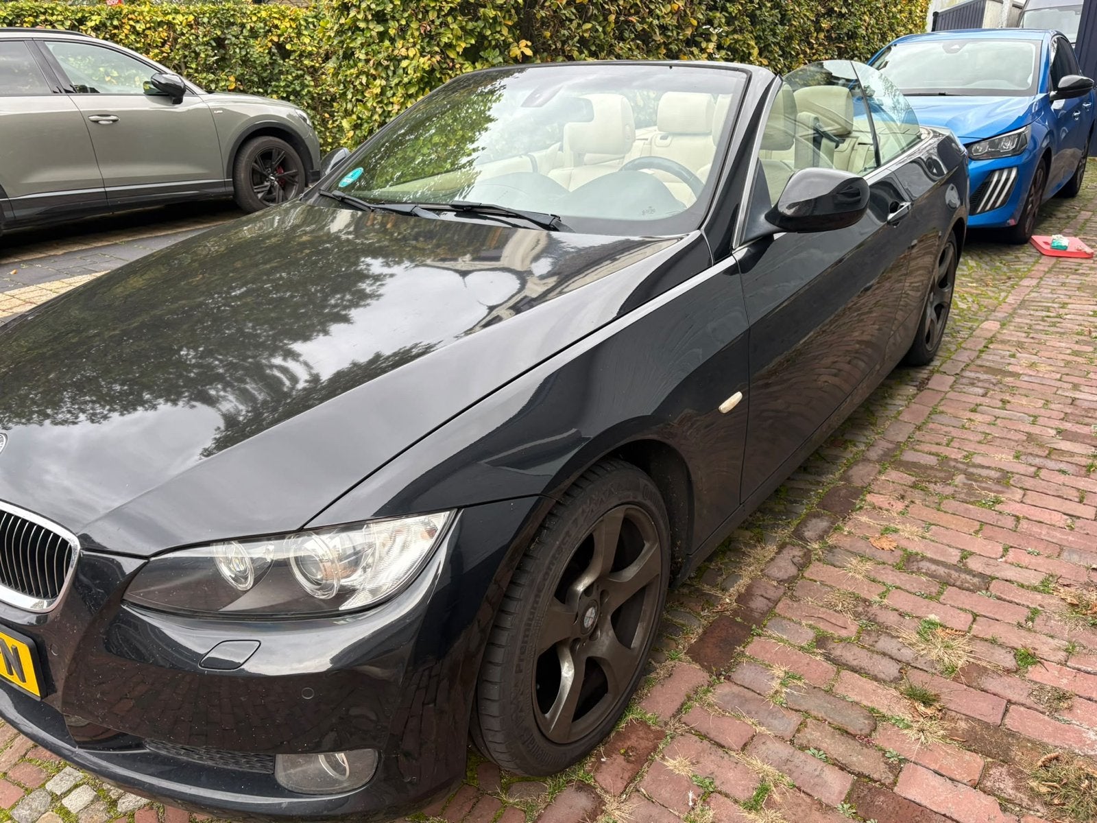 BMW 3-Serie 3.0 I 325i Cabrio AUT 2010 Zwart, Auto's, 745 kg, Achterwielaandrijving, Beige, Cabriolet