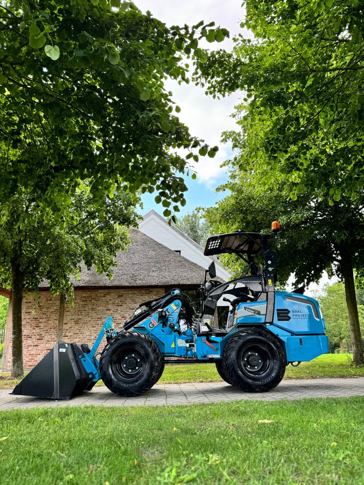 Te huur: Compacte Giant kniklader met aanhanger, Ophalen