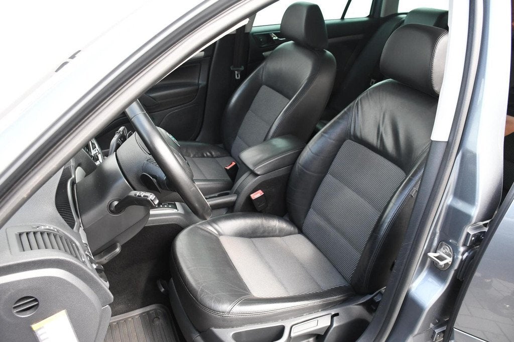 Skoda Octavia Combi 1.4 TSI Elegance Stoelverwarming Trekhaa, Auto's, Skoda, Euro 5, Gebruikt, Zwart, 4 cilinders