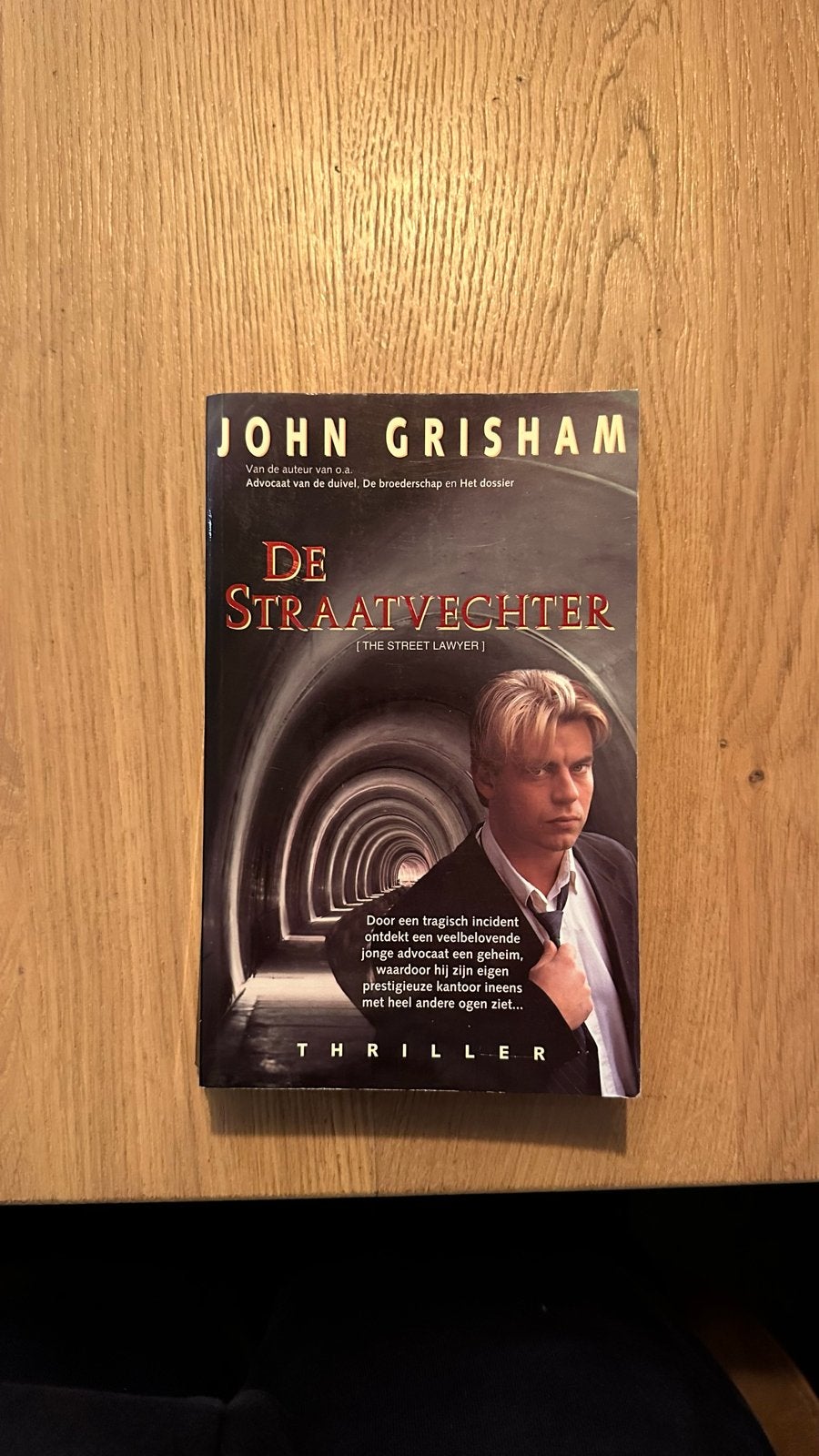 John Grisham - De Straatvechter (Thriller), Ophalen of Verzenden, Gelezen, Nederland