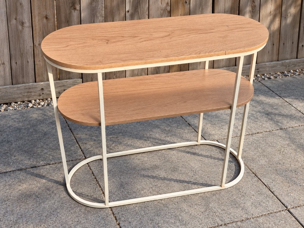 Ovale sidetable houtlook met wit metalen frame en legplank, Ophalen, Gebruikt, 100 tot 150 cm, 25 tot 50 cm