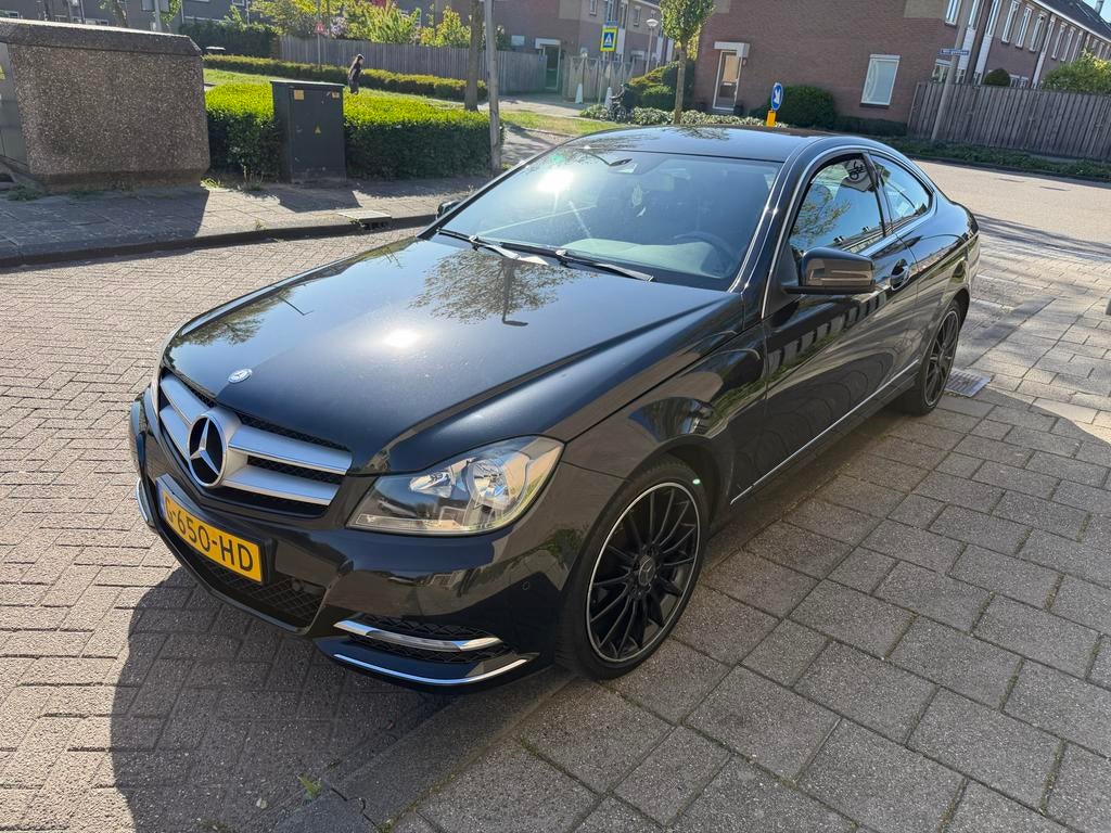 Mercedes-Benz C-Klasse C180 156pk 2012 Zwart, Auto's, Mercedes-Benz, Automaat, Parkeersensor, Achterwielaandrijving, 1800 kg