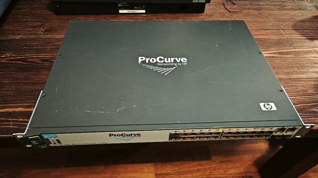 HP ProCurve 2610-24-PoE 2410/100, 2x SFP J9087A, Computers en Software, Netwerk switches, Verzenden, Gebruikt