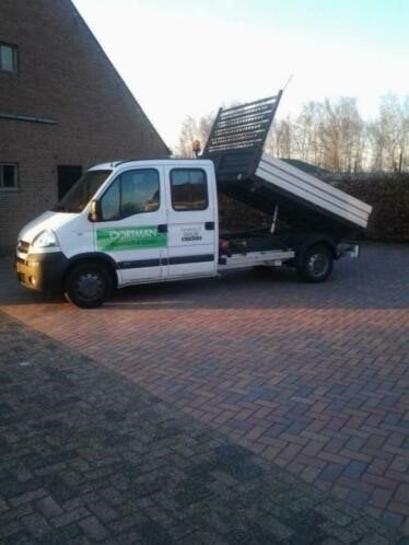 Minitrekker met overtopfrees en chauffeur, Ophalen, Tuinaarde