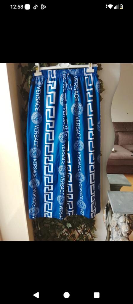 Blauwe broek met Versace-print, Maat 38/40 (M), Blauw, Ophalen of Verzenden, Lang