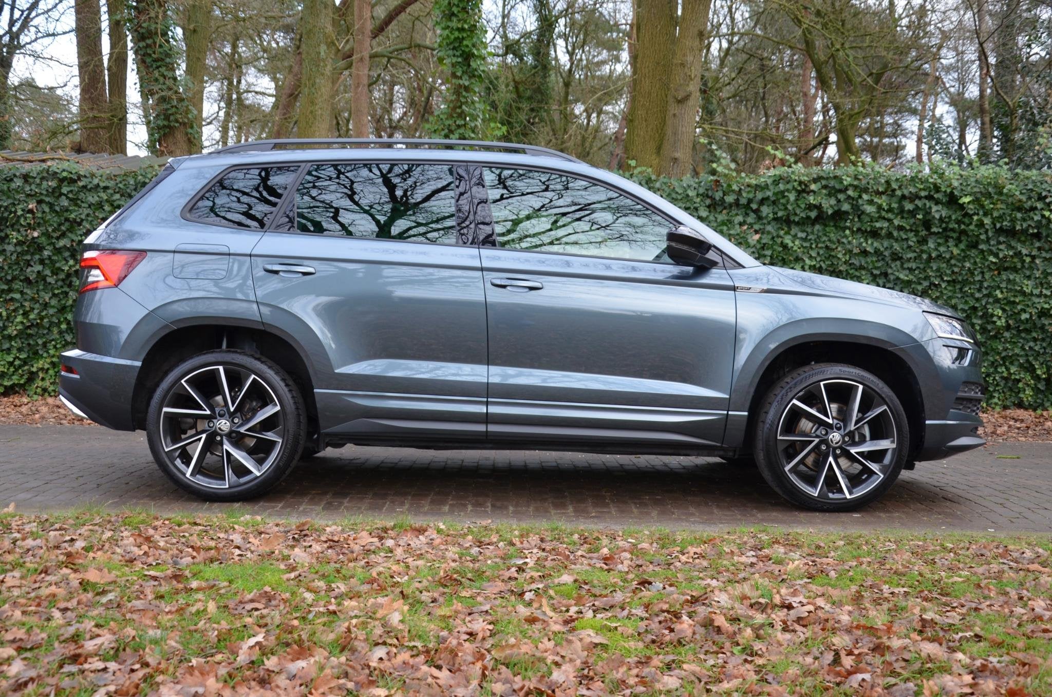 Skoda Karoq 1.5 TSI ACT Sportline Business Automaat/Navi/Led, Auto's, Stof, 4 cilinders, Bedrijf, 19 km/l